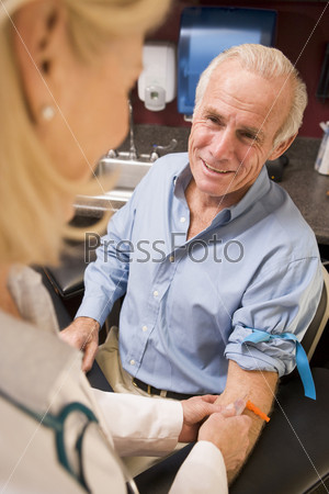 Middle Aged Man Having Blood Test Done