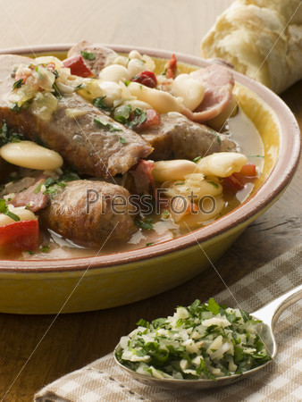 Bowl of Toulouse Sausage and Butter Bean Ragout with Persillade