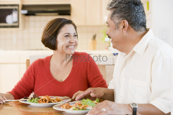 Elderly Couple Enjoying meal, mealtime Together