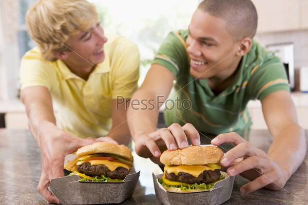 Teenagers Eating Burgers