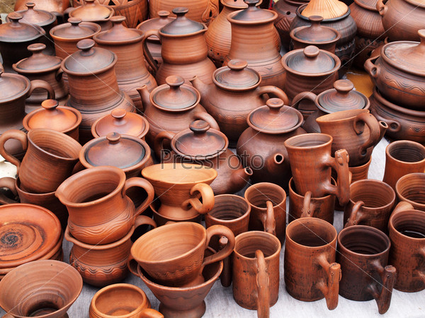 Showcase of handmade ceramic pottery in a roadside market