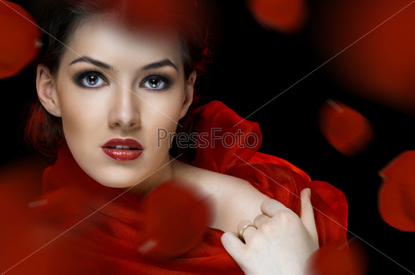 A beauty girl on the dark background, stock photo