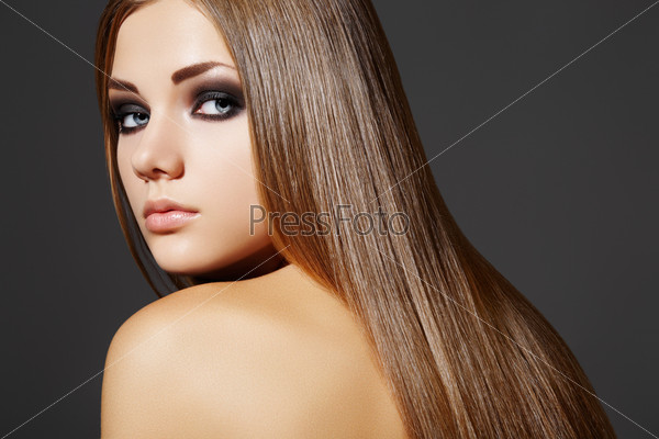 Wellness. Portrait of woman model with shiny long brown hair