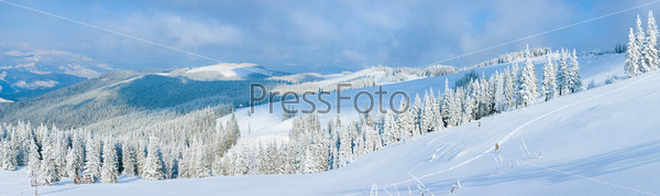 Winter calm mountain panorama landscape with sheds and mount ridge behind (Carpathian Mountains, Ukraine). Eight shots stitch image.
