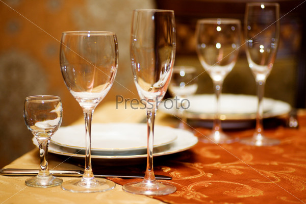 Glasses on Restaurant Table before big Party begins