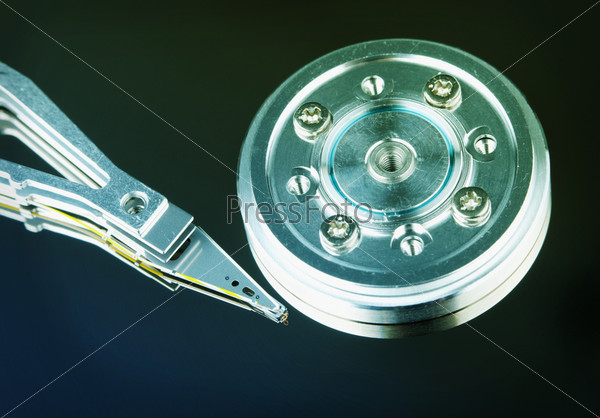 Spindle and magnetic head of a computer hard disk, stock photo