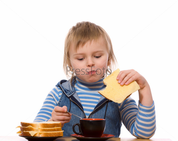 Girl eating cheese sandwich isolated on white