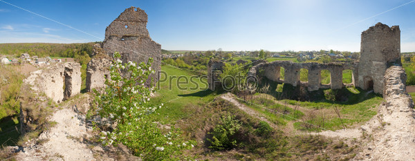 Spring view of Sydoriv Castle ruins (built in 1640s). Sydoriv village,  located 7 km south of Husiatyn town, Ternopil region, Ukraine.  Six shots stitch image.