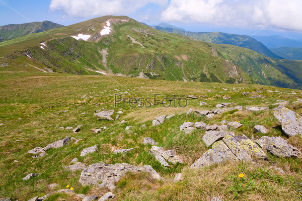 summer mountain ridge and snow on mountainside(Ukraine, Chornogora Ridge, Carpathian Mountains)