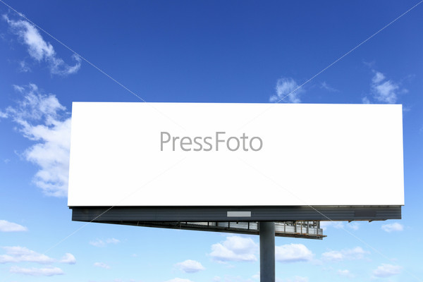 Blank billboard against blue sky, put your own text here