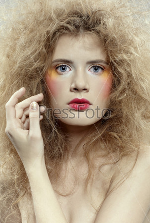 close-up portrait of caucasian girl with girl with shock hair-do