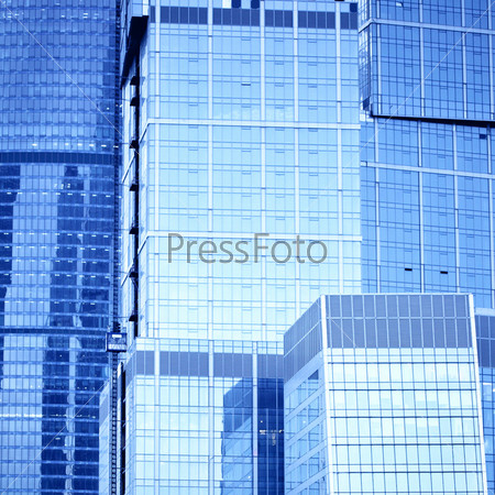 Modern skyscrapers close-up toned in blue color
