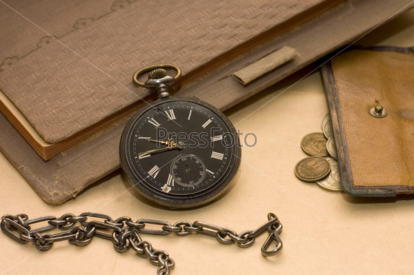 The old book, old watch and money