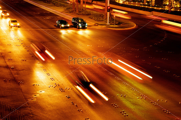 Moving traffic and car lights in the evening, stock photo