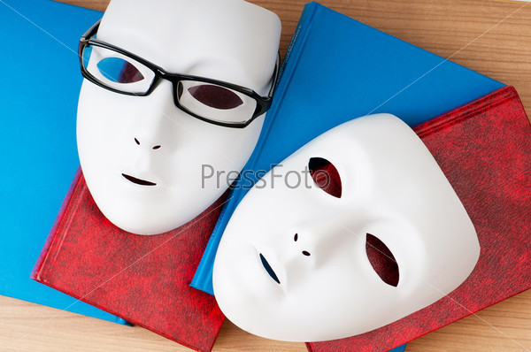 Reading concept with masks, books and, stock photo