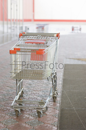 Two empty carts in a supermarket
