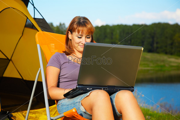 woman with laptop outdoor