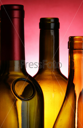 Bottle-necks close-up over red background