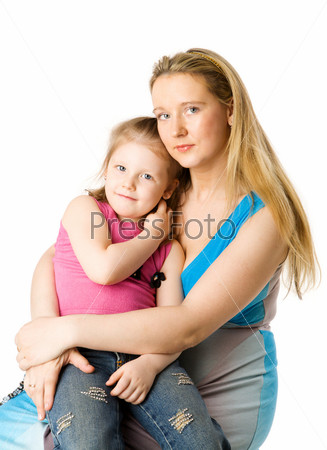 Mother holding five years daughter isolated on white