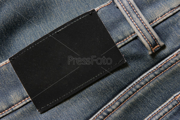 Jeans with blank black label - put your own text here