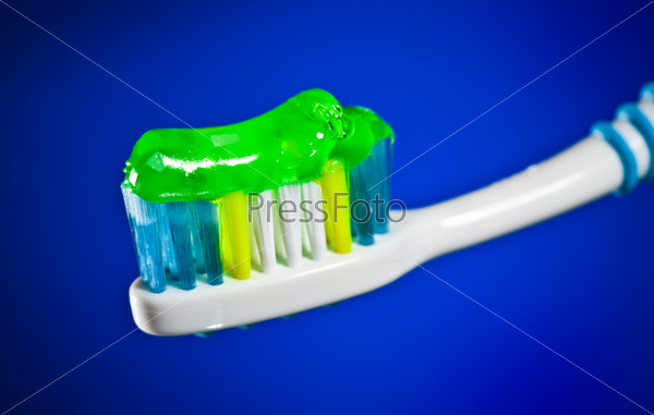 Toothbrush on a dark blue background