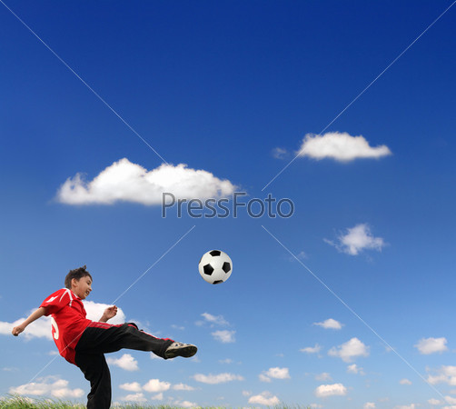 asian boy playing football