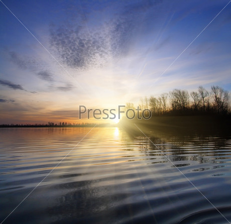 river landscape with sunset against ripple water