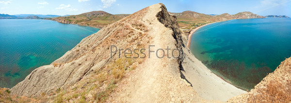 Summer rocky coastline and camping on sandy beach (Tihaja Bay (Koktebel Town in left), Crimea, Ukraine ). All peoples and cars is aunrecognizable, Three shots stitch image.