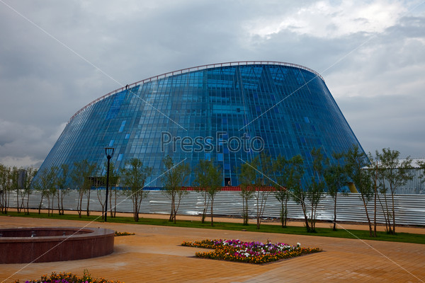 A new modern building of glass in the capital of Kazakhstan, stock photo