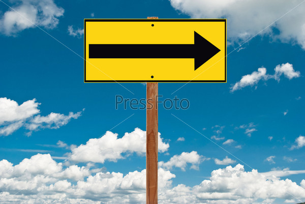 Yellow street sign at blue sky background, stock photo