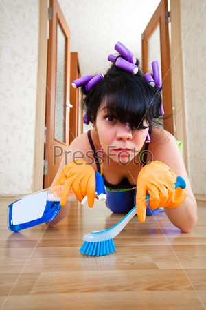 housewife washes a floor in the house