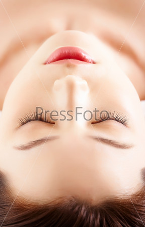Face of calm female before procedure of facial massage