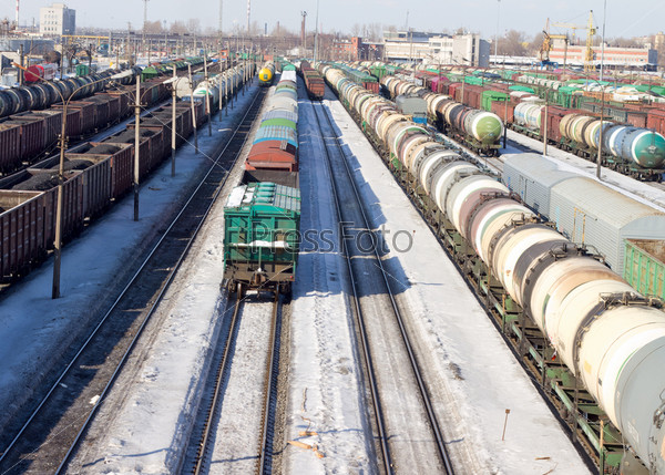 Freight cars in cargo port in the early spring, stock photo