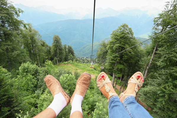 Cable way Legs of man and woman