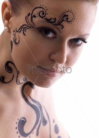 Woman face with paint close-up portrait