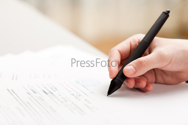 Human business men hand pen writing paper document