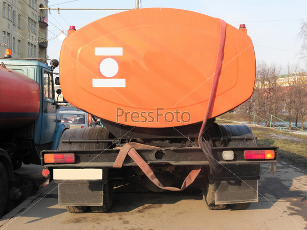 The image of a back of a harvester truck, stock photo