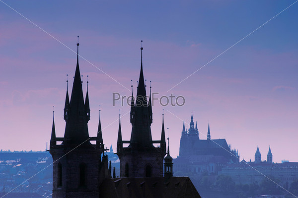 Czech Republic, Prague, silhouette of high section of Tyn church at night.