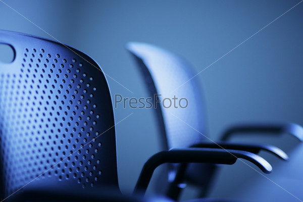 Modern office chairs detail, shallow DOF.