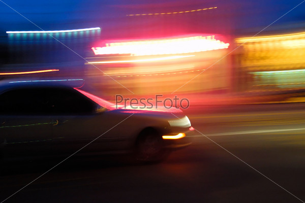 Speeding car, blurred motion