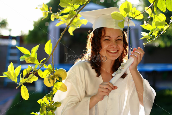 Young graduate woman happy with diploma