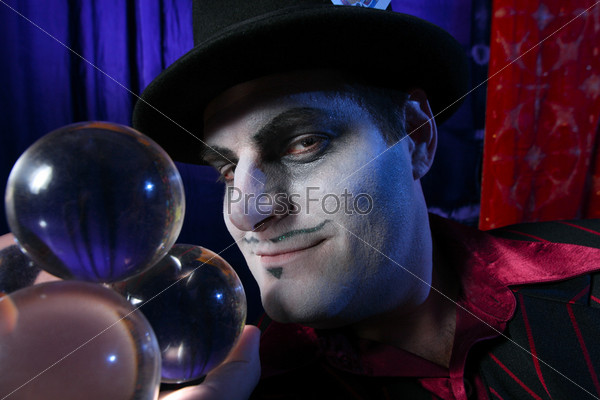 Magician with crystal balls