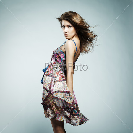 Beautiful woman with elegant summer dress. Fashion photo