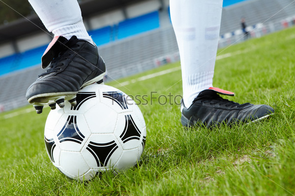 Horizontal Image Of Soccer Ball With Foot Of Player Touching It