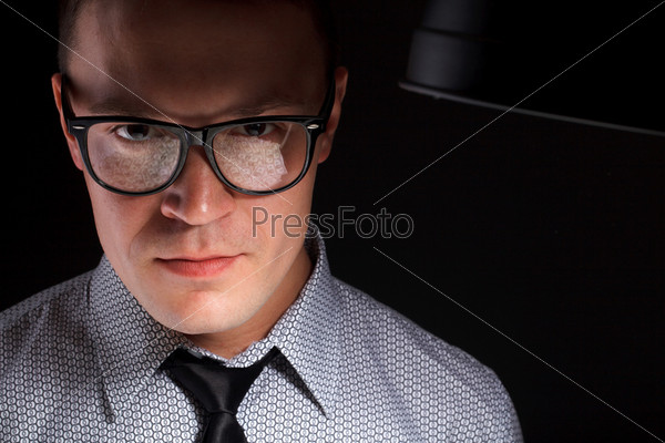 young man in glasses with money reflection