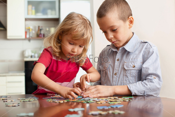 Children, playing puzzles at home (montessori, thinking,\
children)