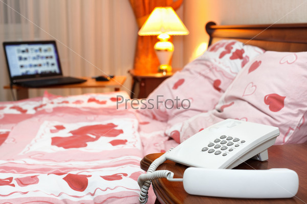 Bedroom Interior With Phone And Laptop