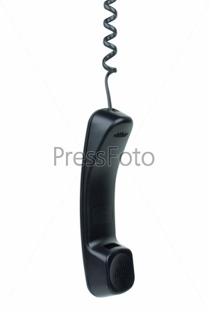 Black phone handset hanging on cord isolated on the white background