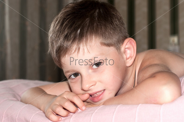 Smiling, cute five year old boy portrait on background, stock photo