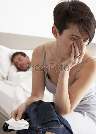 Suspicious Wife Finding Receipt In Husband\'s Pocket Whilst He Sleeps